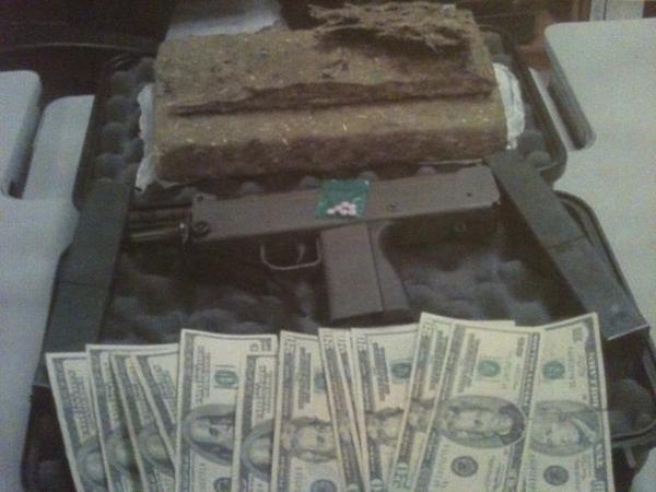 A gun and money.