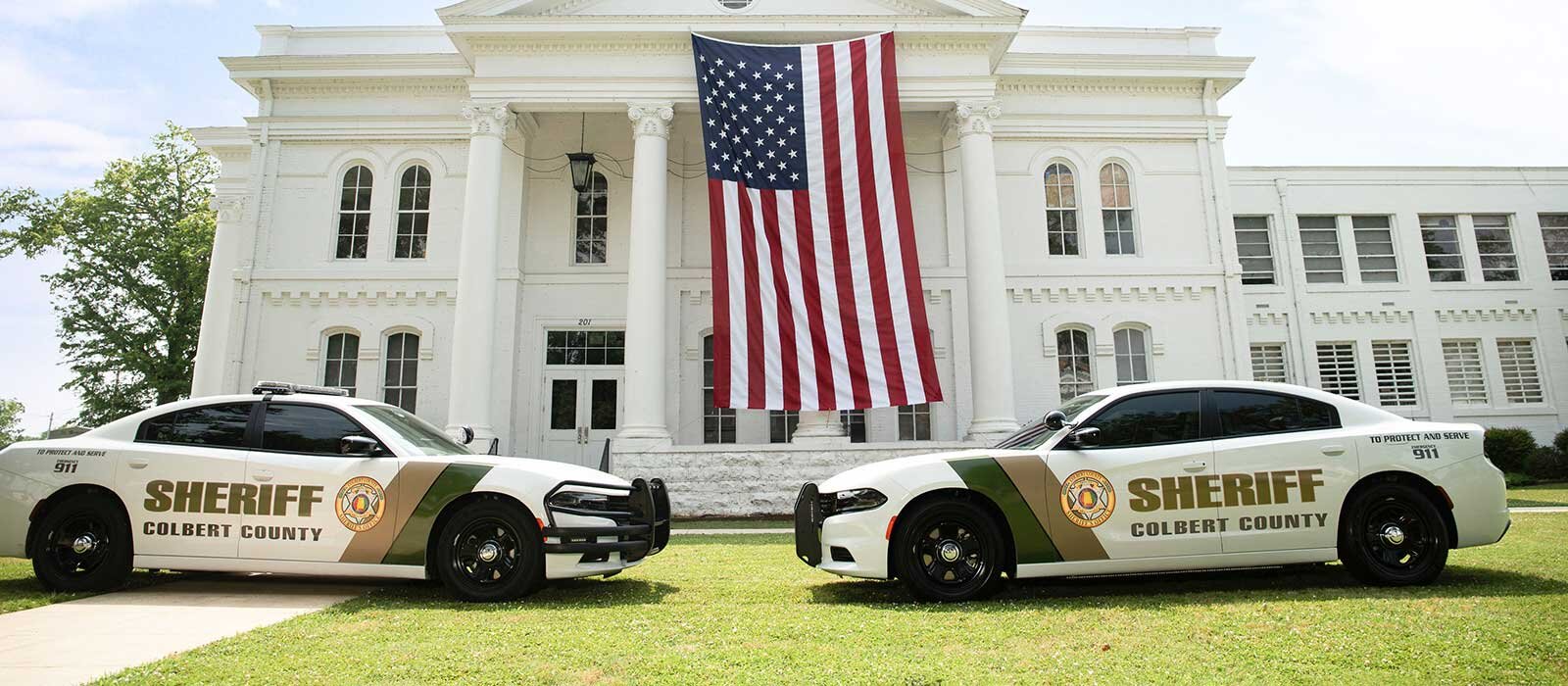 Colbert County Sheriff Patrol Vehicles in front of the Courthouse.